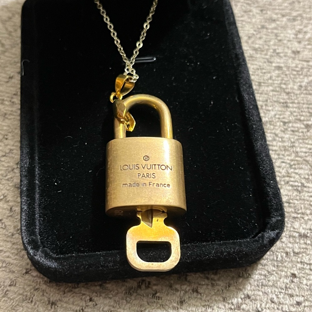 Louis Vuitton lock and key necklace. 18” long. Lock number 319. - Picture 3 of 8